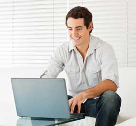 Man studying alcohol awareness class at his computer